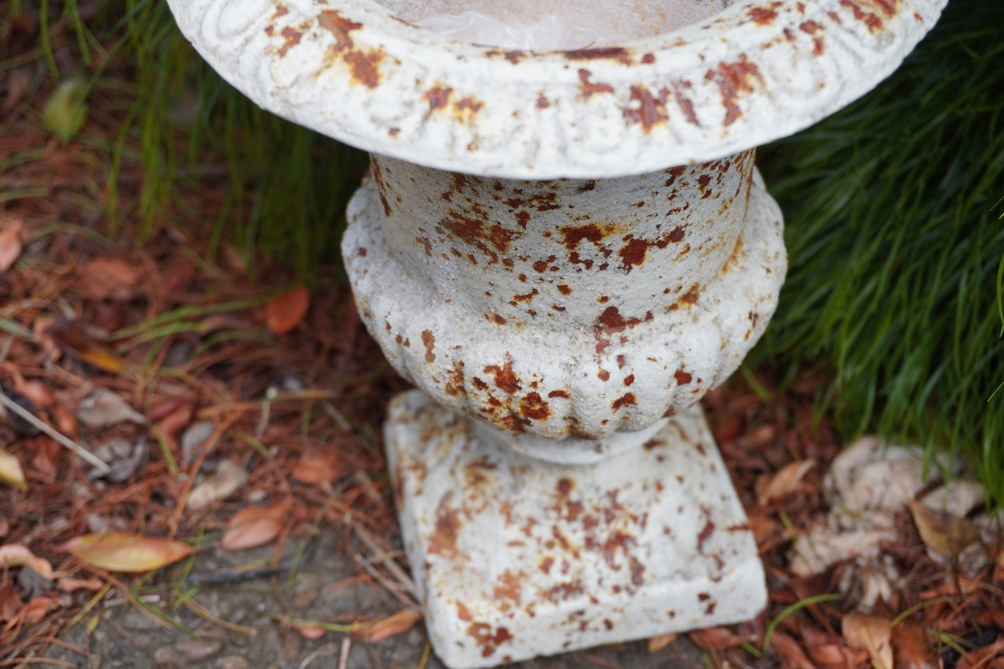 close up of rusted Medici Urn