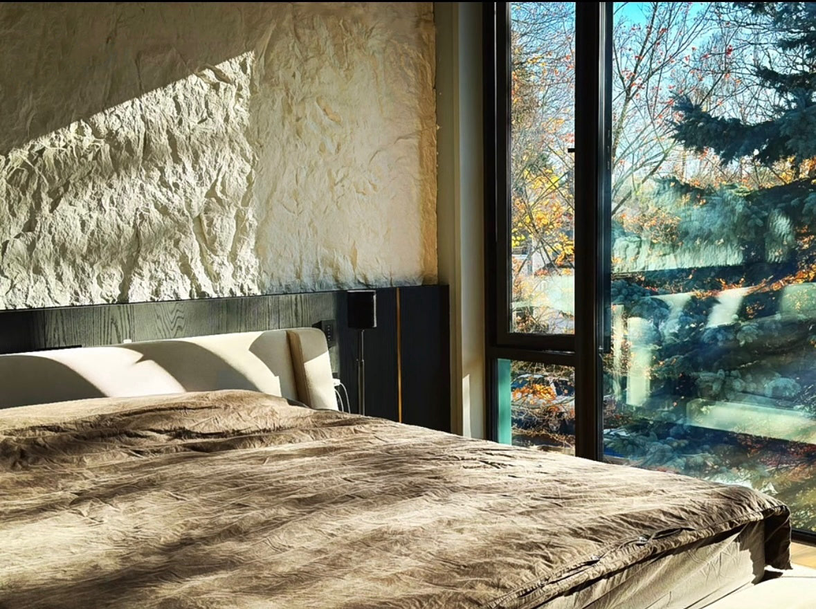beige structured rock panel for bedroom