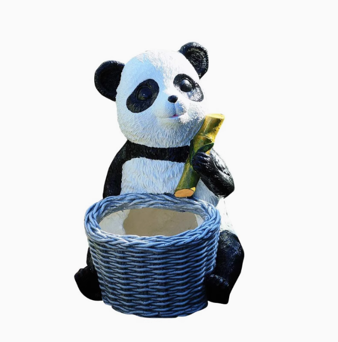 panda holding bamboo