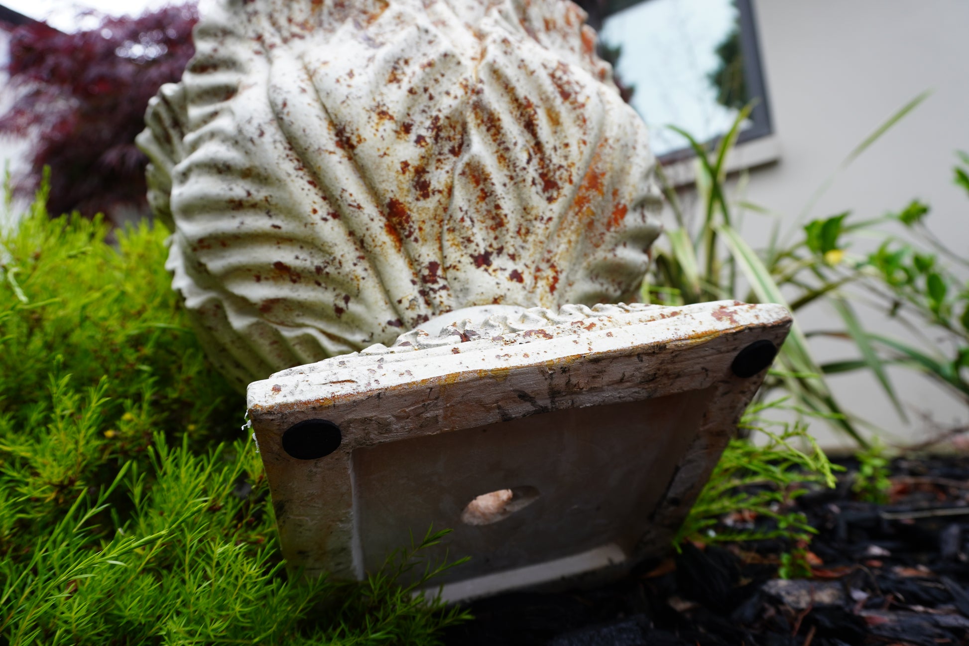 aged leaf urn view from under