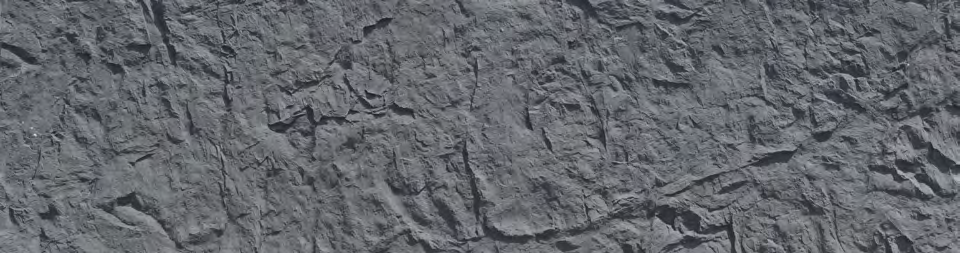 black structured rock panel close up